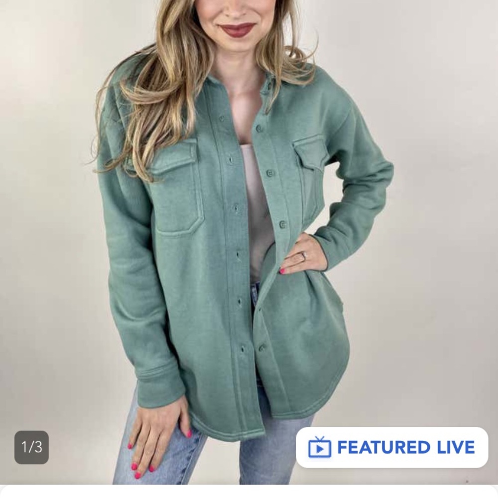 Reflex size large. Very soft light weight, fleece lined. Sage green